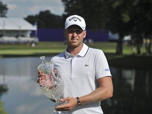 Daniel Berger posing with the St. Jude Classic trophy again